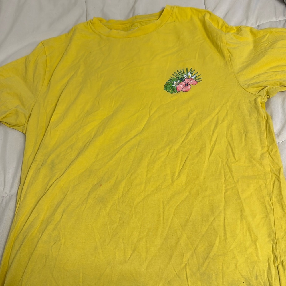 Yellow vineyard vines short sleeve. Has a very small red stain.